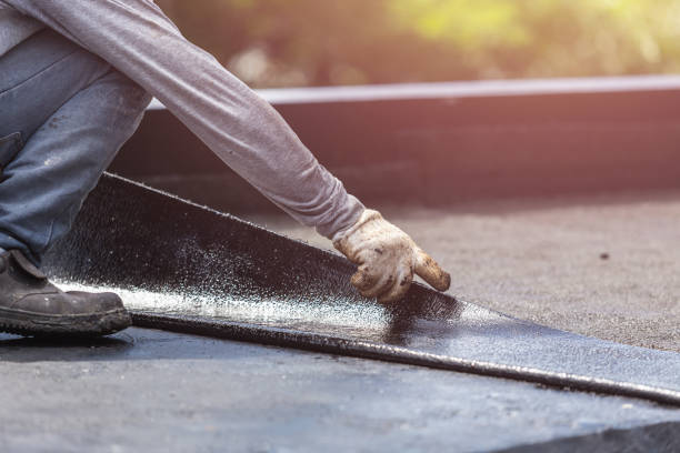 Professional Basement Waterproofing technician working in Unionville, VA